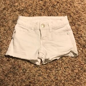White shorts with stringy bottom